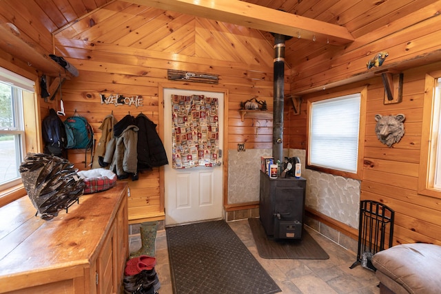 143 Mayfield Rd, Moscow, ME 04920 - mudroom with a wood stove, wood walls, and wooden ceiling