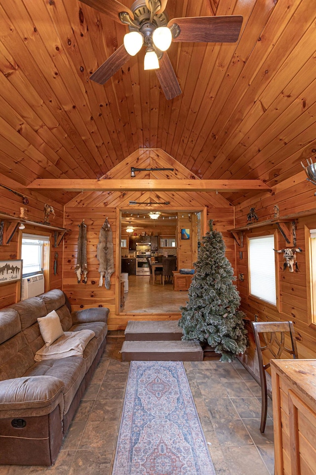 143 Mayfield Rd, Moscow, ME 04920 - living room featuring wood walls, vaulted ceiling, a ceiling fan, plenty of natural light, and wood ceiling