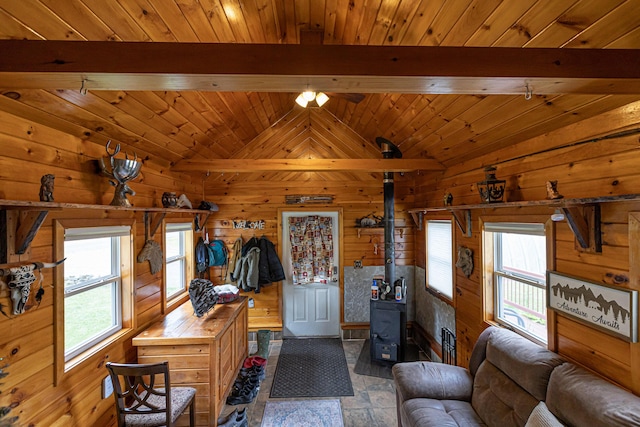 143 Mayfield Rd, Moscow, ME 04920 - living room with a wood stove, wood walls, and wood ceiling