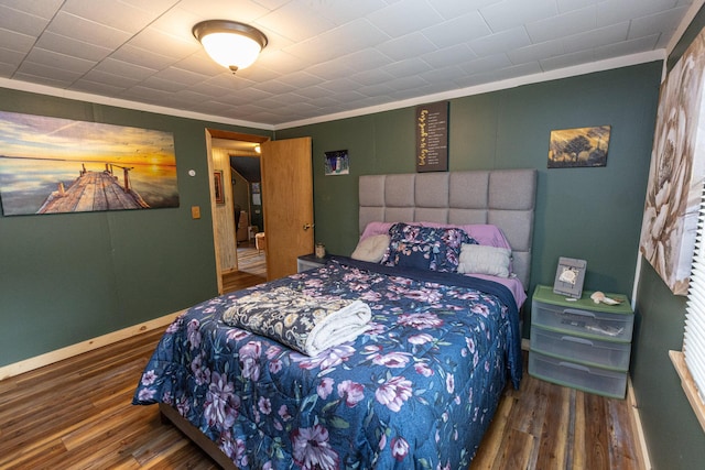 143 Mayfield Rd, Moscow, ME 04920 - bedroom with wood finished floors and ornamental molding
