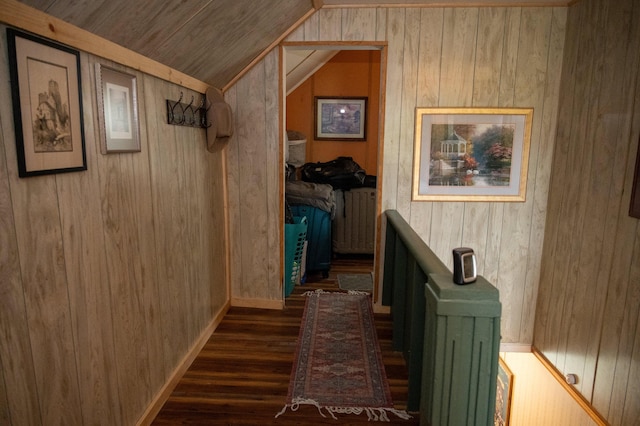 143 Mayfield Rd, Moscow, ME 04920 - corridor with wooden walls, wood finished floors, and vaulted ceiling