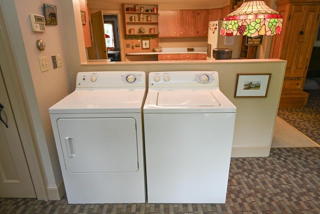 337 Copeland Hill Rd, Holden, ME 04429 - washroom with washing machine and clothes dryer and baseboards