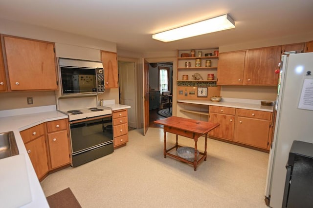 337 Copeland Hill Rd, Holden, ME 04429 - kitchen with white appliances, open shelves, light countertops, and brown cabinetry