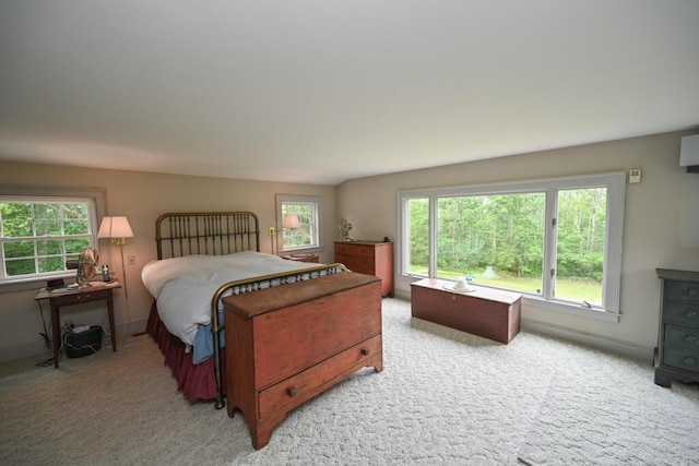 337 Copeland Hill Rd, Holden, ME 04429 - bedroom featuring light colored carpet and multiple windows