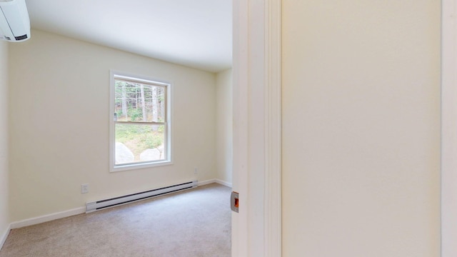 452 Flat Rd, Bethel, ME 04217 - carpeted spare room featuring a baseboard radiator and a wall mounted AC