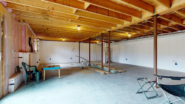 452 Flat Rd, Bethel, ME 04217 - unfinished below grade area featuring water heater