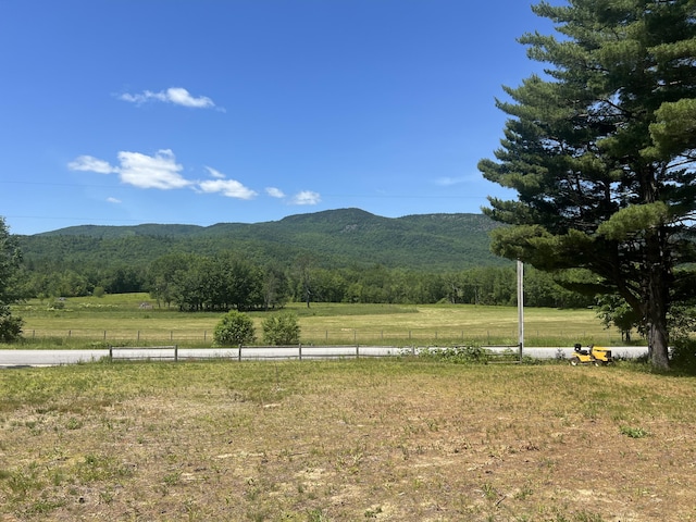 452 Flat Rd, Bethel, ME 04217 - mountain view featuring rural landscape and a forest