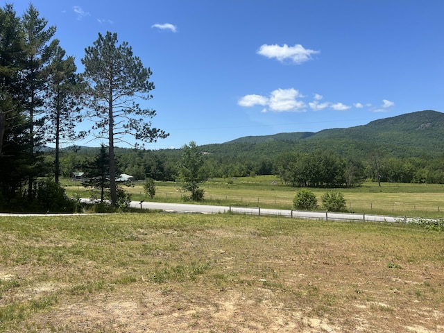 452 Flat Rd, Bethel, ME 04217 - view of mountain backdrop with rural landscape