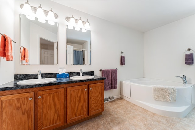 61 Dwelly Point Rd, Franklin, ME 04634 - full bath featuring double vanity and a garden tub