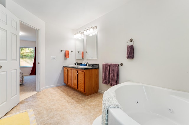 61 Dwelly Point Rd, Franklin, ME 04634 - full bath featuring a jetted tub and double vanity