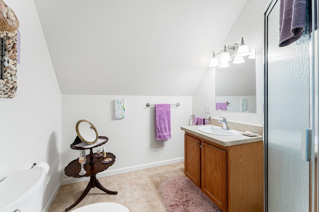 61 Dwelly Point Rd, Franklin, ME 04634 - bathroom with vaulted ceiling, vanity, a shower with door, and tile patterned floors