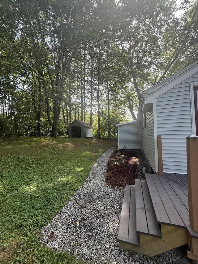 69 Heath St, Oakland, ME 04963 - view of grassy yard with a storage shed