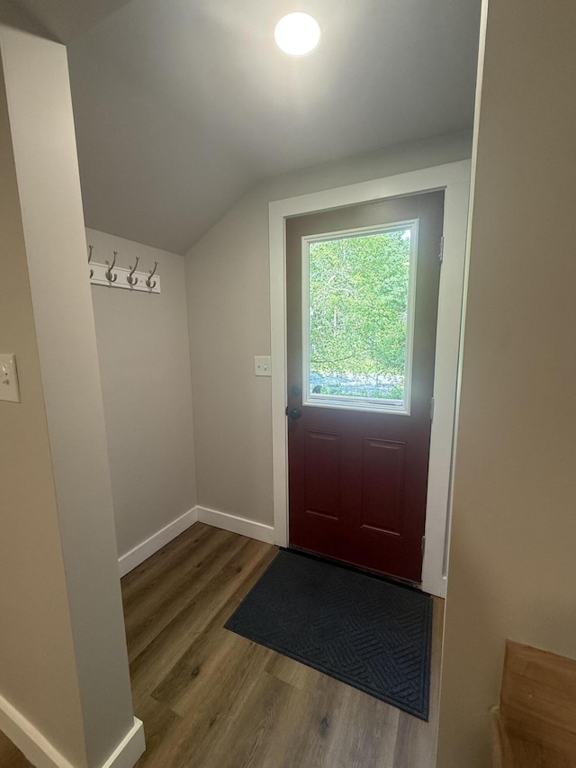 69 Heath St, Oakland, ME 04963 - doorway to outside featuring wood finished floors and vaulted ceiling