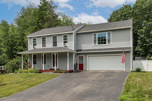 13 Dobson Rd, Berwick, ME 03901 - view of front of home with asphalt driveway, an attached garage, a porch, and a shingled roof