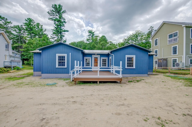 61 Shore Rd, Sebago, ME 04029 - rear view of property featuring a wooden deck