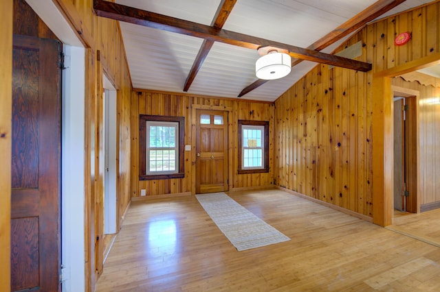61 Shore Rd, Sebago, ME 04029 - entryway with wooden walls and light wood-type flooring