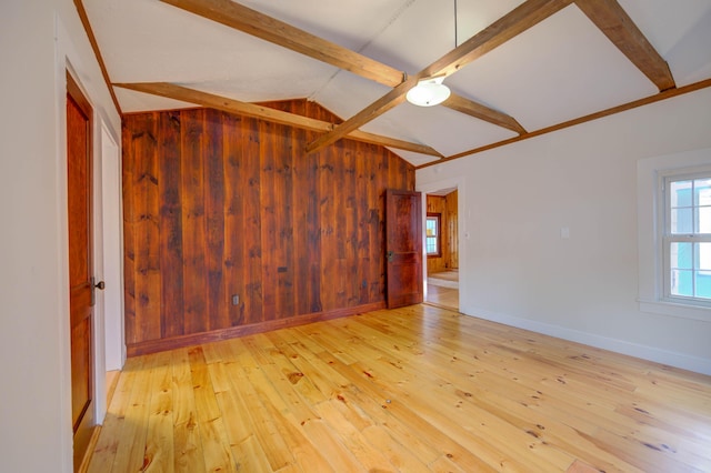 61 Shore Rd, Sebago, ME 04029 - spare room with hardwood / wood-style floors and wooden walls