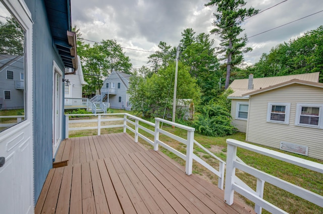 61 Shore Rd, Sebago, ME 04029 - wooden terrace with a yard