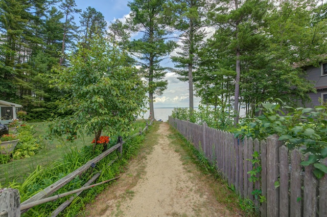 61 Shore Rd, Sebago, ME 04029 - view of yard featuring a water view