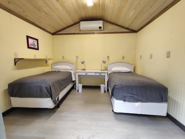 114 E Shore Rd, Benedicta Twp, ME 04733 - bedroom with a wall mounted AC, lofted ceiling, wood finished floors, wood ceiling, and wooden walls