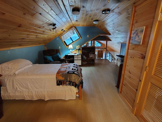 114 E Shore Rd, Benedicta Twp, ME 04733 - bedroom featuring wood finished floors, wood ceiling, and lofted ceiling