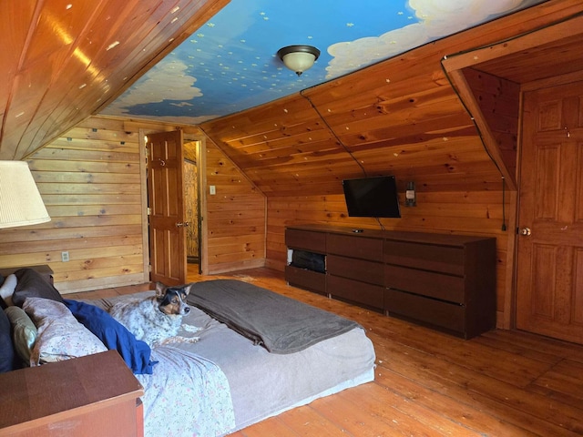 471 Chandler Hill Rd, Ripley, ME 04930 - bedroom with lofted ceiling, hardwood / wood-style flooring, wooden walls, and wood ceiling