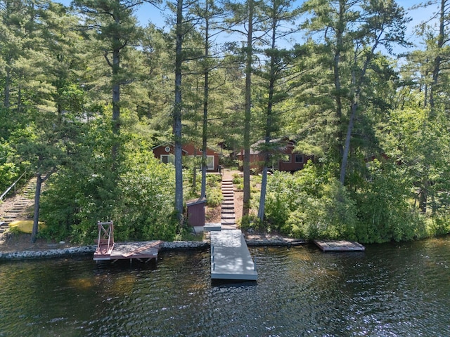 48 Green Bay Rd, Newfield, ME 04095 - dock area featuring stairway and a water view