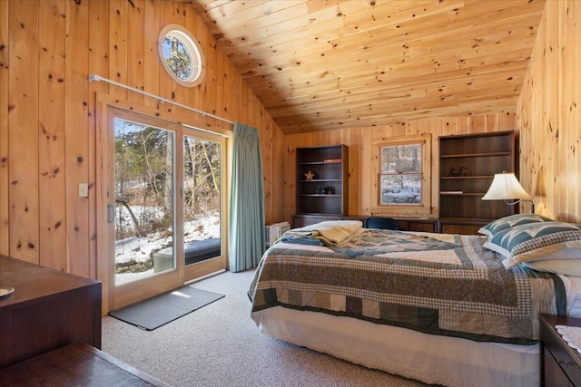 48 Green Bay Rd, Newfield, ME 04095 - bedroom with wooden walls, access to exterior, carpet flooring, wood ceiling, and high vaulted ceiling