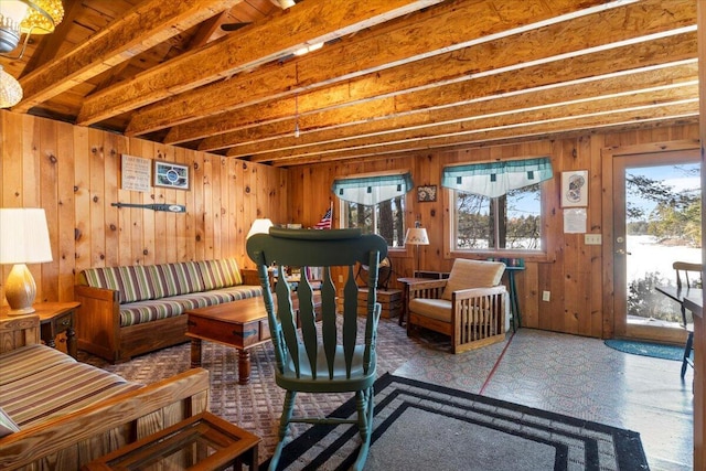48 Green Bay Rd, Newfield, ME 04095 - living area featuring plenty of natural light, beamed ceiling, and wooden walls