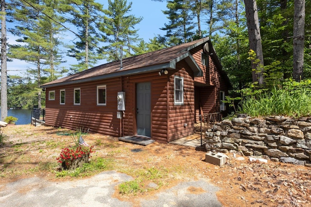 48 Green Bay Rd, Newfield, ME 04095 - view of front of house featuring faux log siding