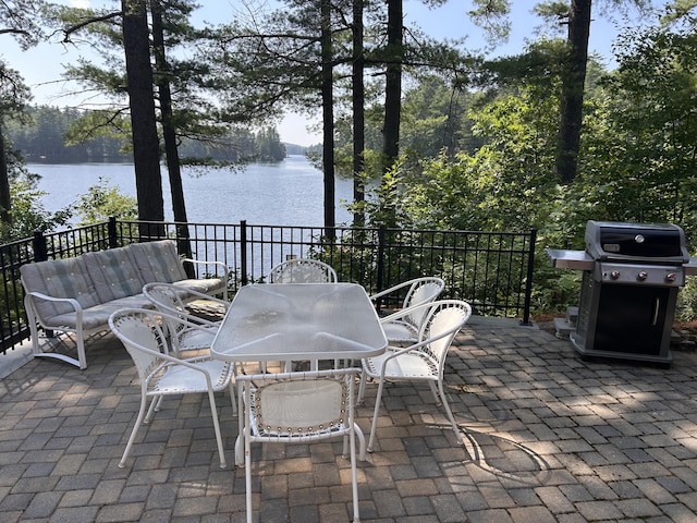 48 Green Bay Rd, Newfield, ME 04095 - view of patio featuring a water view, area for grilling, and outdoor dining space