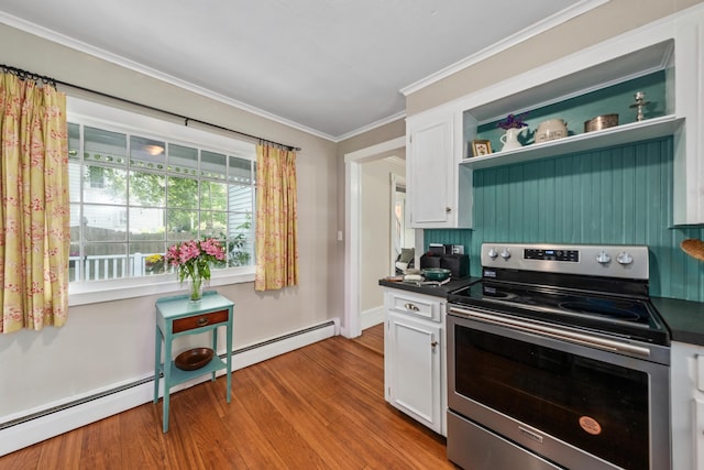 5 Purchase St, Rockland, ME 04841 - kitchen with stainless steel range with electric stovetop, dark countertops, baseboard heating, white cabinets, and open shelves