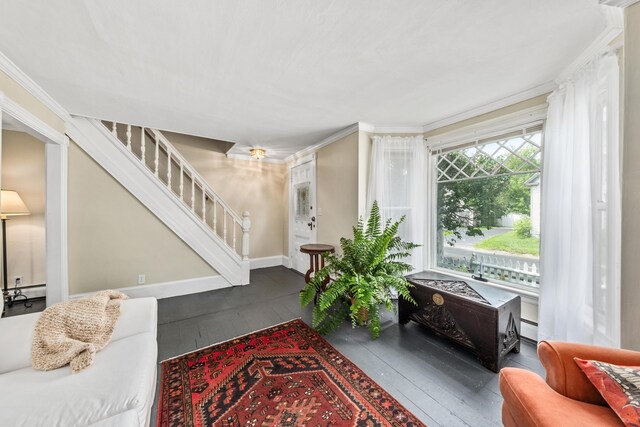 5 Purchase St, Rockland, ME 04841 - living area with wood-type flooring, crown molding, stairs, and a baseboard radiator