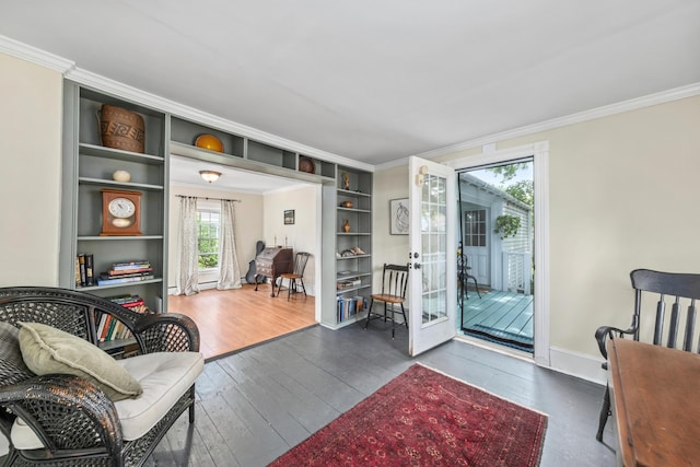 5 Purchase St, Rockland, ME 04841 - sitting room with french doors, crown molding, plenty of natural light, and hardwood / wood-style floors