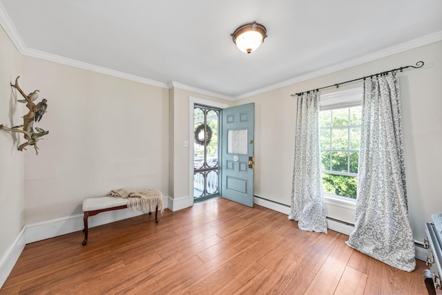 5 Purchase St, Rockland, ME 04841 - entrance foyer featuring plenty of natural light, ornamental molding, and light wood-type flooring