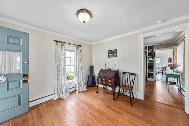 5 Purchase St, Rockland, ME 04841 - entryway featuring light wood-style flooring, baseboard heating, and crown molding