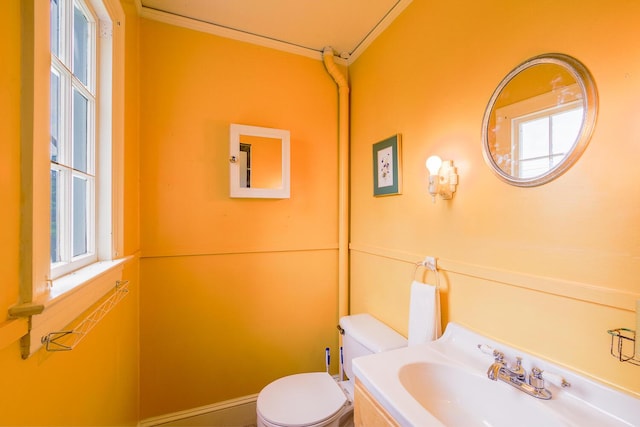 69 W Meadow Rd, Rockland, ME 04841 - bathroom with toilet and ornamental molding