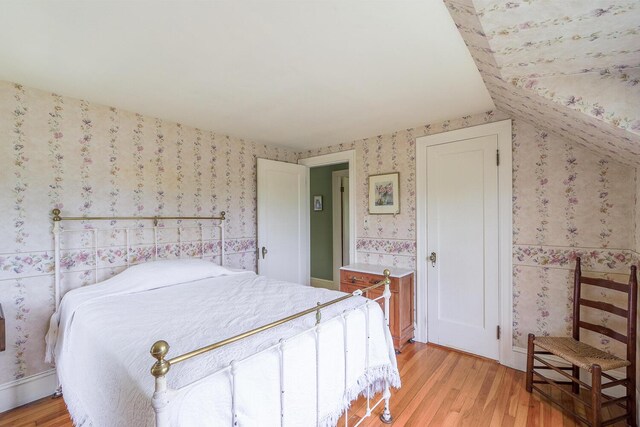 69 W Meadow Rd, Rockland, ME 04841 - bedroom featuring light wood-type flooring and wallpapered walls