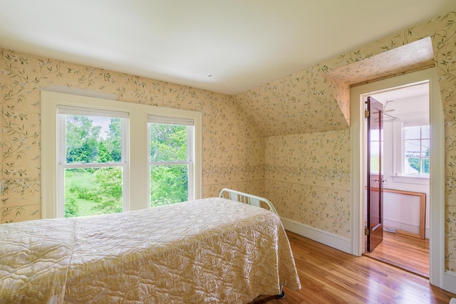 69 W Meadow Rd, Rockland, ME 04841 - bedroom with wallpapered walls and wood finished floors