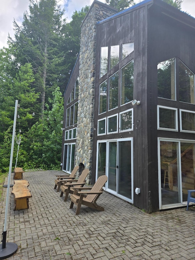 24 Cliffside Dr, Saint Albans, ME 04971 - back of property with a patio area