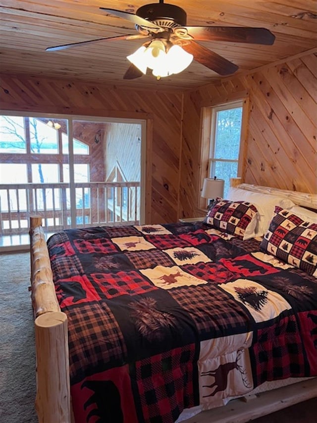 24 Cliffside Dr, Saint Albans, ME 04971 - bedroom with carpet flooring, wood walls, wood ceiling, and a ceiling fan
