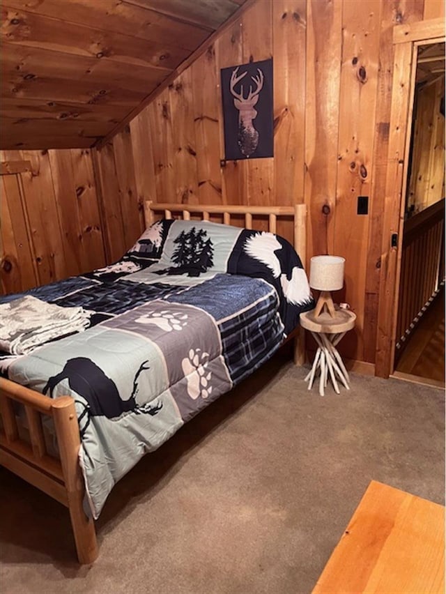 24 Cliffside Dr, Saint Albans, ME 04971 - carpeted bedroom with wood walls, wooden ceiling, and vaulted ceiling