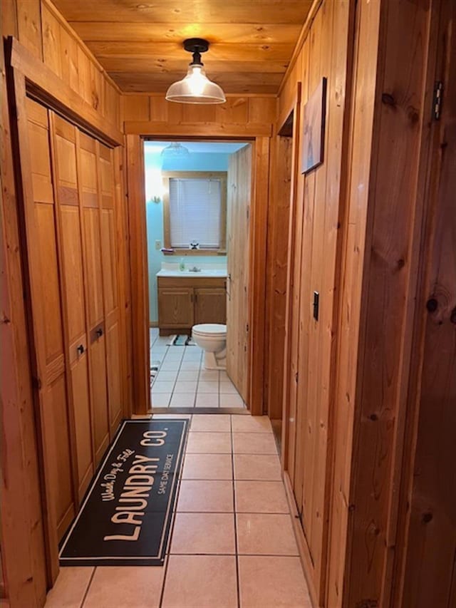 24 Cliffside Dr, Saint Albans, ME 04971 - hall featuring wood ceiling, light tile patterned floors, and wooden walls