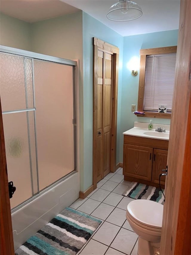 24 Cliffside Dr, Saint Albans, ME 04971 - bathroom featuring vanity, tile patterned flooring, and shower / bath combination with glass door