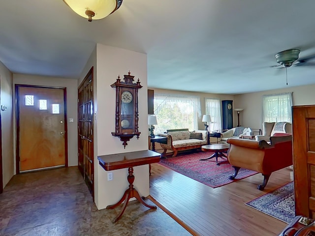 63 N Shore Dr, Owls Head, ME 04854 - foyer featuring healthy amount of natural light, wood finished floors, and a ceiling fan