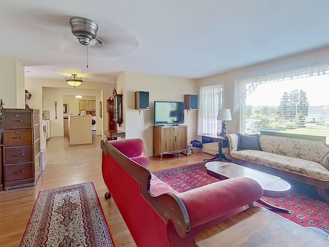 63 N Shore Dr, Owls Head, ME 04854 - living area with a ceiling fan and light wood-type flooring