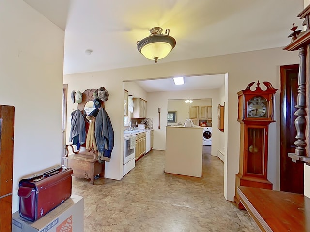 63 N Shore Dr, Owls Head, ME 04854 - foyer entrance featuring washer / dryer