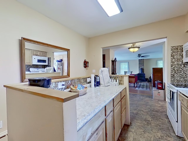 63 N Shore Dr, Owls Head, ME 04854 - kitchen with white appliances, a ceiling fan, and open floor plan