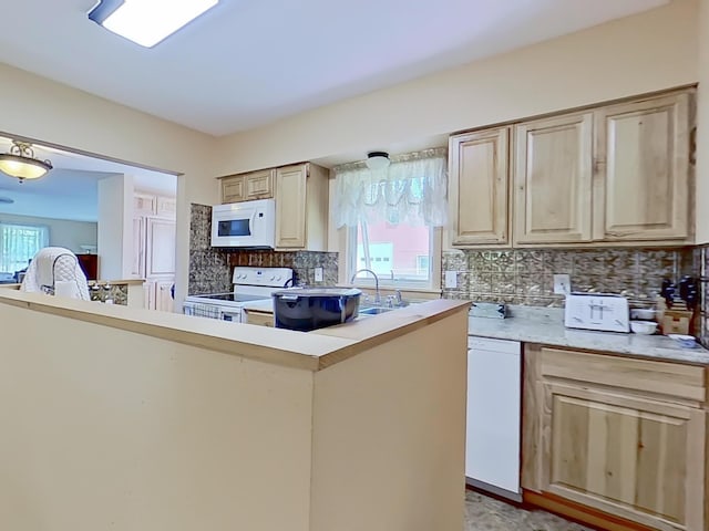 63 N Shore Dr, Owls Head, ME 04854 - kitchen featuring white appliances, tasteful backsplash, light countertops, and light brown cabinets