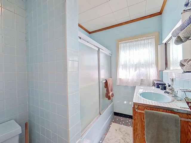 63 N Shore Dr, Owls Head, ME 04854 - bathroom featuring crown molding, vanity, and combined bath / shower with glass door